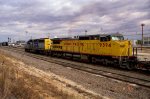 UP 9394 follows CSX 8144 northbound thru the yard